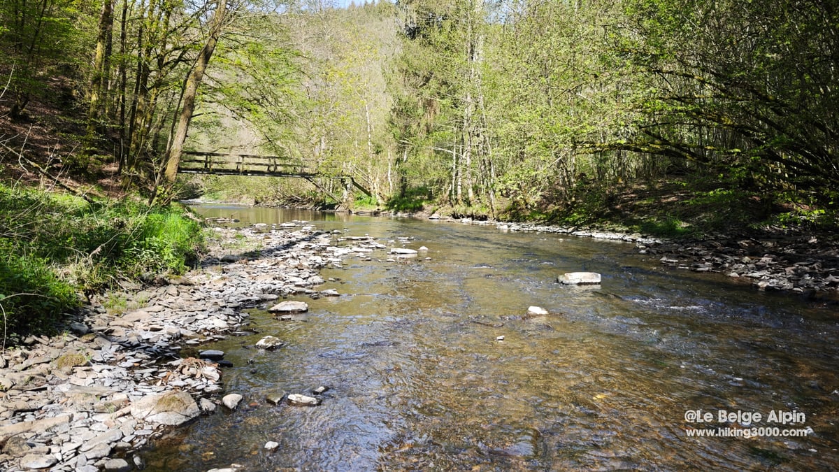 The Lieser crossed by a wooden footbridge, downstream from the ruins