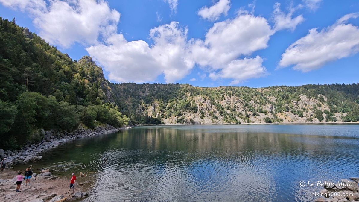 A lake at the foot of its great cliff, a ridgeline classic