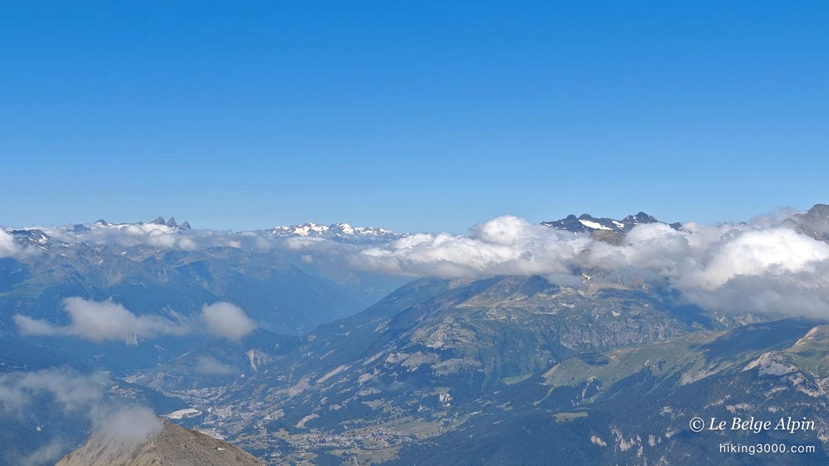 The Aiguilles d'Arves poke above the cotton wool, on the Maurienne side
